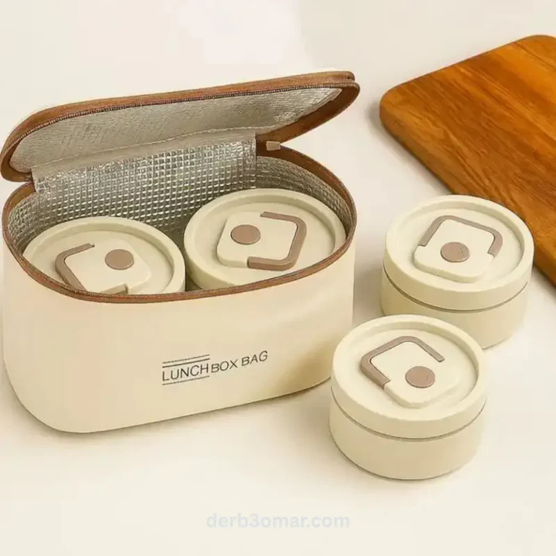 Lunch box compartimentée pour repas chaud et froid en déplacement Lunch box compartimentée pour repas chaud et froid en déplacement